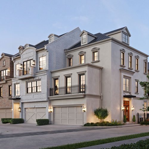 Wellington townhomes with distinct facades and iron balconies in Memorial Green